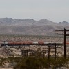 A BNSF westbound TOFC train takes the signal at Ash Hill, Calif. on BNSF's Needles Subdivision. March 6, 2006.