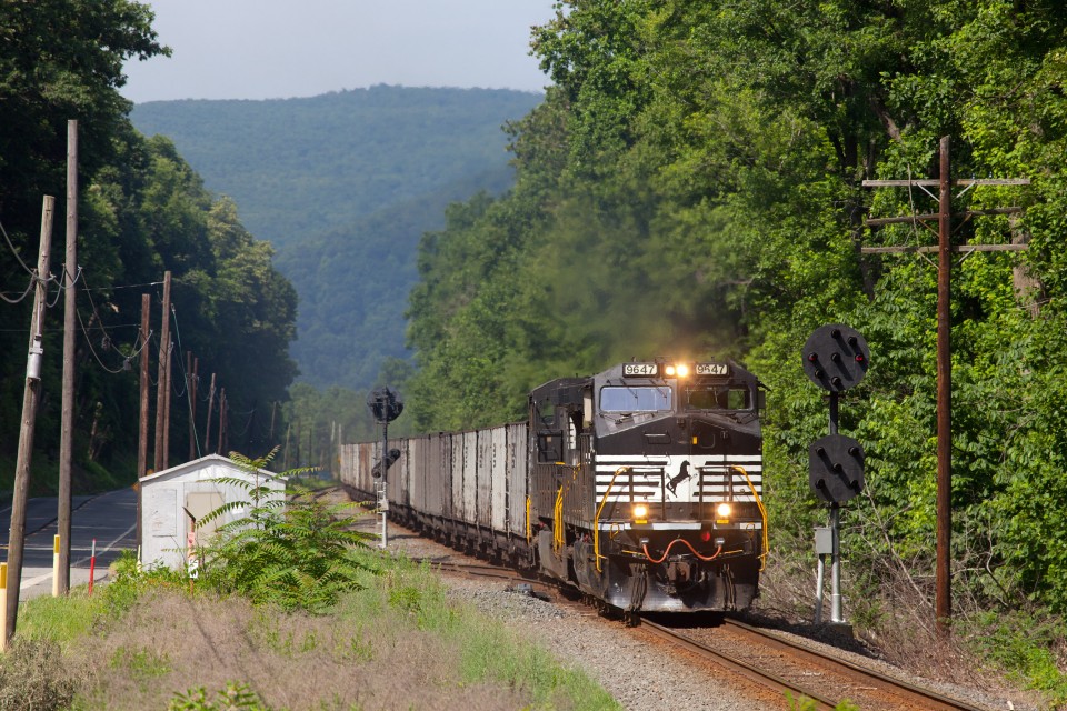 NS 9647 C40-9W leading NS 633 (Enola-Newberry) coal empties northbound