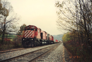 Peter McGilligan took me up to Binghamton one fall day in 1991 in a quest for Canadian Pacific's MLW locomotives, based on Alco designs from the 1960's. Southbound CP train 554 was stopped at Nineveh, N.Y. behind CP 4729 and CP 4719, both M636's.